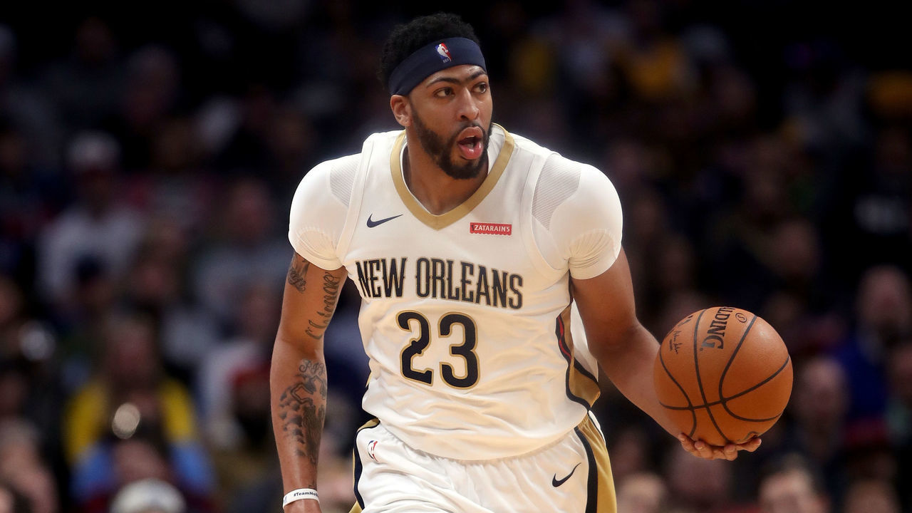 DENVER, CO - NOVEMBER 17: Anthony Davis #23 of the New Orleans Pelicans brings the ball down the court against the Denver Nuggets at the Pepsi Center on November 17, 2017 in Denver, Colorado.
