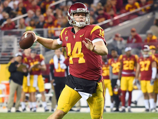 SANTA CLARA, CA - DECEMBER 01: Sam Darnold #14 of the USC Trojans looks to throw a pass against the Stanford Cardinal during the Pac-12 Football Championship Game at Levi's Stadium on December 1, 2017 in Santa Clara, California.