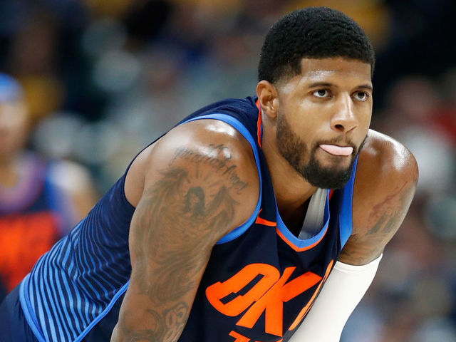 INDIANAPOLIS, IN - DECEMBER 13: Paul George #13 of the Oklahoma City Thunder watches the action in the game against the Indiana Pacers at Bankers Life Fieldhouse on December 13, 2017 in Indianapolis, Indiana.