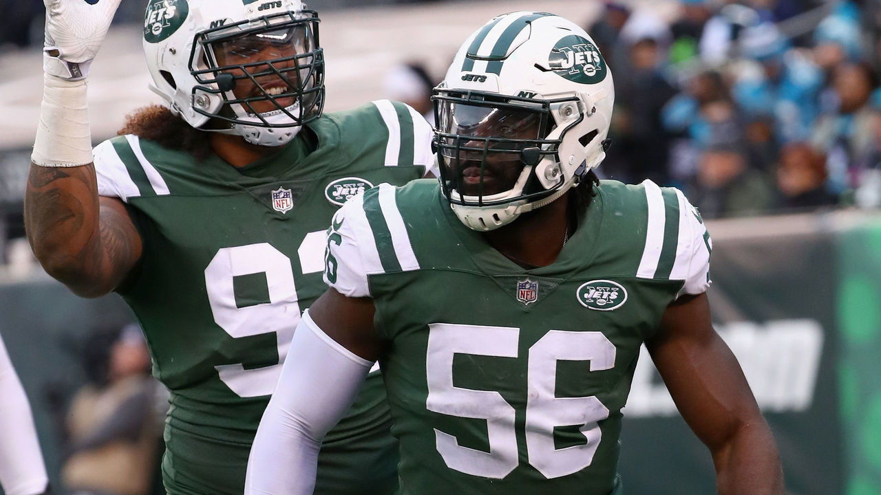 EAST RUTHERFORD, NJ - NOVEMBER 26: Inside linebacker Demario Davis #56 of the New York Jets celebrates after sacking quarterback Cam Newton #1 of the Carolina Panthers during the third quarter of the game at MetLife Stadium on November 26, 2017 in East Rutherford, New Jersey.