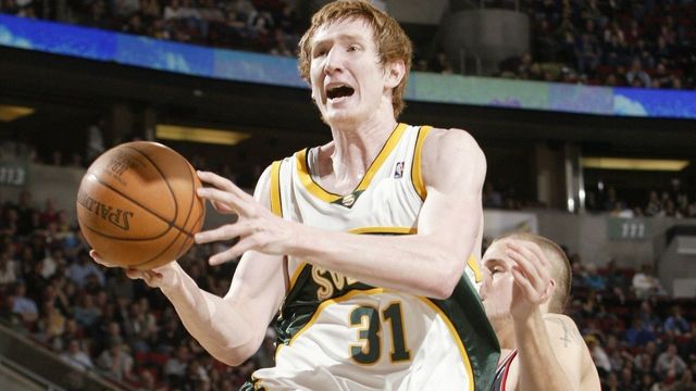 SEATTLE - APRIL 2: Robert Swift #31 of the Seattle SuperSonics shoots against Joel Przybilla #10 of the Portland Trail Blazers at Key Arena on April 2, 2006 in Seattle, Washington. The Sonics defeated the Blazers 122-83. NOTE TO USER: User expressly acknowledges and agrees that, by downloading and/or using this Photograph, user is consenting to the terms and conditions of the Getty Images License Agreement.