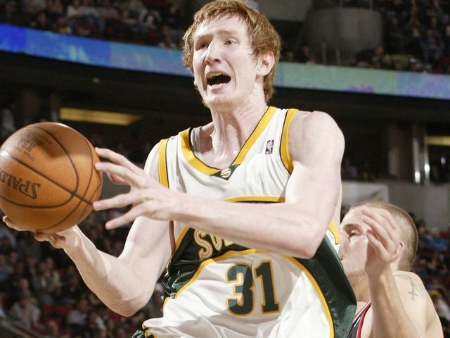SEATTLE - APRIL 2: Robert Swift #31 of the Seattle SuperSonics shoots against Joel Przybilla #10 of the Portland Trail Blazers at Key Arena on April 2, 2006 in Seattle, Washington. The Sonics defeated the Blazers 122-83. NOTE TO USER: User expressly acknowledges and agrees that, by downloading and/or using this Photograph, user is consenting to the terms and conditions of the Getty Images License Agreement.