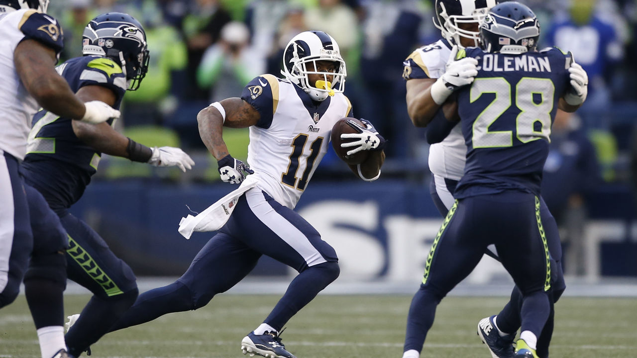SEATTLE, WA - DECEMBER 17: Wide receiver Tavon Austin #11 of the Los Angeles Rams rushes against the Seattle Seahawks during the fourth quarter of the game at CenturyLink Field on December 17, 2017 in Seattle, Washington.