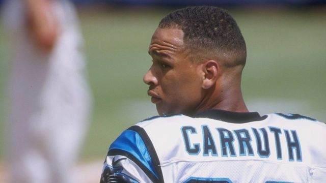 SAN DIEGO - SEPTEMBER 14: Rae Carruth #83 of the Carolina Panthers looks on from the sidelines during a game against the San Diego Chargers on September 14, 1997 at Qualcomm Stadium in San Diego, California. The Panthers defeated the Chargers 26-7.