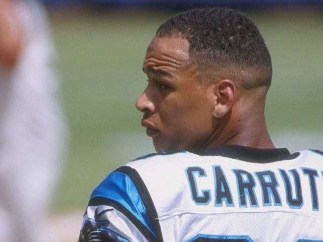 SAN DIEGO - SEPTEMBER 14: Rae Carruth #83 of the Carolina Panthers looks on from the sidelines during a game against the San Diego Chargers on September 14, 1997 at Qualcomm Stadium in San Diego, California. The Panthers defeated the Chargers 26-7.