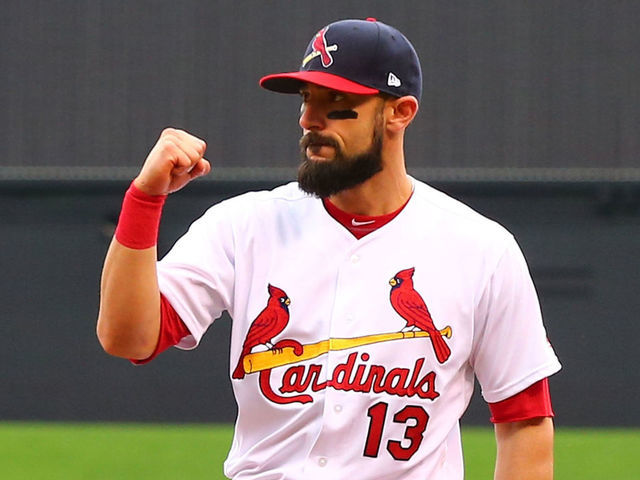 ST. LOUIS, MO - APRIL 30: Matt Carpenter #13 of the St. Louis Cardinals celebrates after turning an inning-ending double play against the Cincinnati Reds in the third inning at Busch Stadium on April 30, 2017 in St. Louis, Missouri.