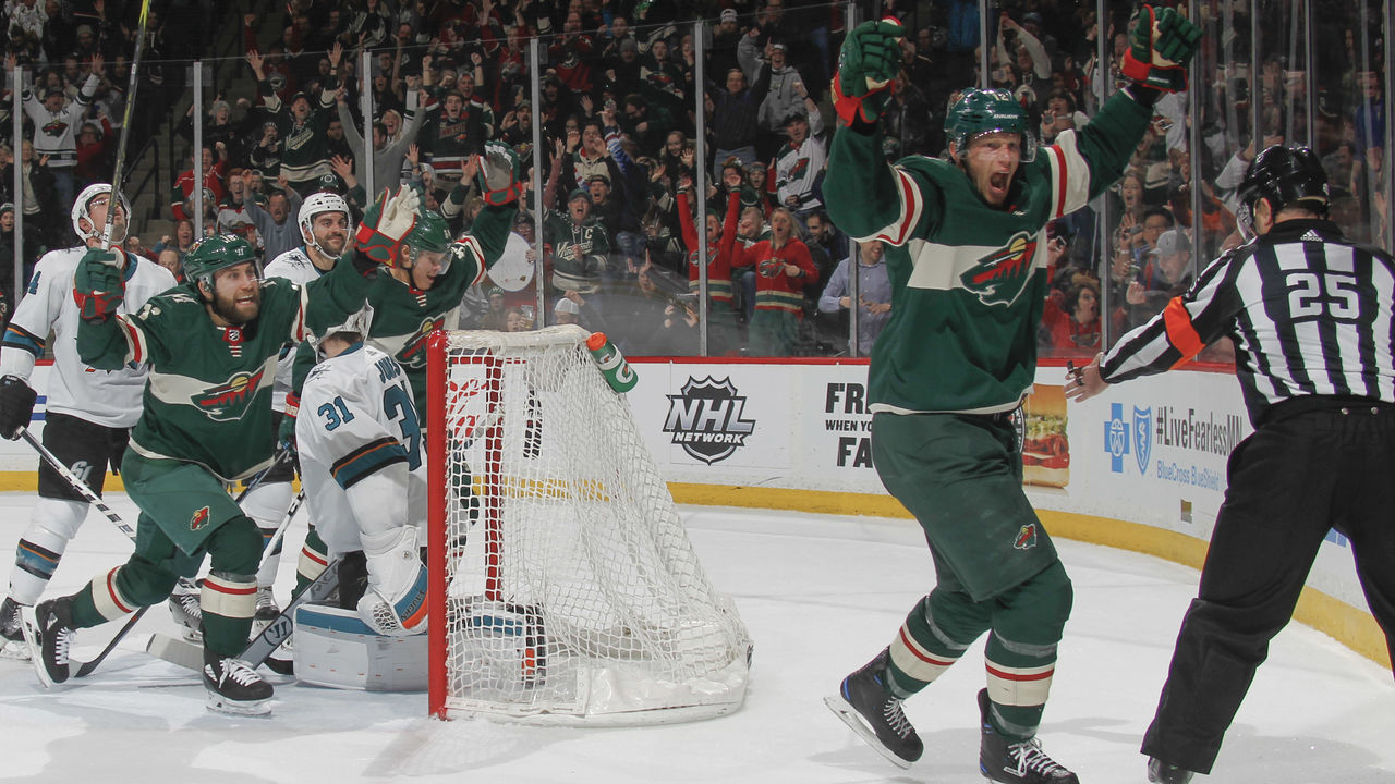 ST. PAUL, MN - FEBRUARY 25: Eric Staal #12 celebrates his goal with his teammate Jason Zucker #16 of the Minnesota Wild against the San Jose Sharks during the game at the Xcel Energy Center on February 25, 2018 in St. Paul, Minnesota.