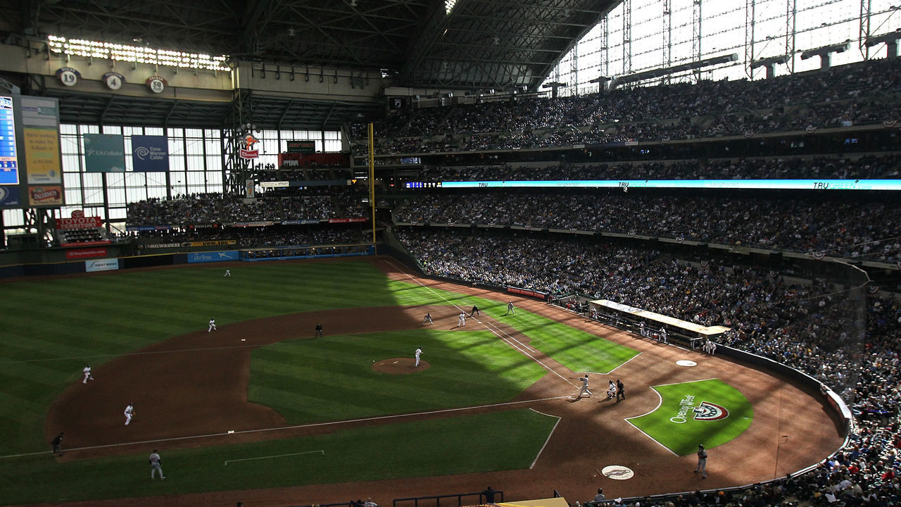 MILWAUKEE, WI - APRIL 04: Sunlight creeps along the first base line during the home opener between the Milwaukee Brewers and the Atlanta Braves at Miller Park on April 4, 2011 in Milwaukee, Wisconsin. The Braves defeated the Brewers 2-1.