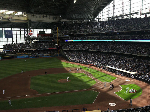 MILWAUKEE, WI - APRIL 04: Sunlight creeps along the first base line during the home opener between the Milwaukee Brewers and the Atlanta Braves at Miller Park on April 4, 2011 in Milwaukee, Wisconsin. The Braves defeated the Brewers 2-1.