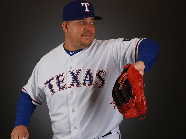 Bartolo Colon is happy to be with the Rangers so he doesn't have to hit or  run 