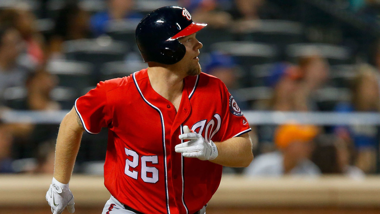 NEW YORK, NY - SEPTEMBER 23: Adam Lind #26 of the Washington Nationals watches the flight of his fourth inning two run home run against the New York Mets at Citi Field on September 23, 2017 in the Flushing neighborhood of the Queens borough of New York City.