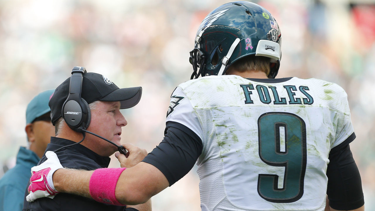 PHILADELPHIA, PA - OCTOBER 5: Head coach Chip Kelly of the Philadelphia Eagles talks with quarterback Nick Foles #9 in the fourth quarter against the St. Louis Rams on October 5, 2014 at Lincoln Financial Field in Philadelphia, Pennsylvania. The Eagles defeated the Rams 34-28