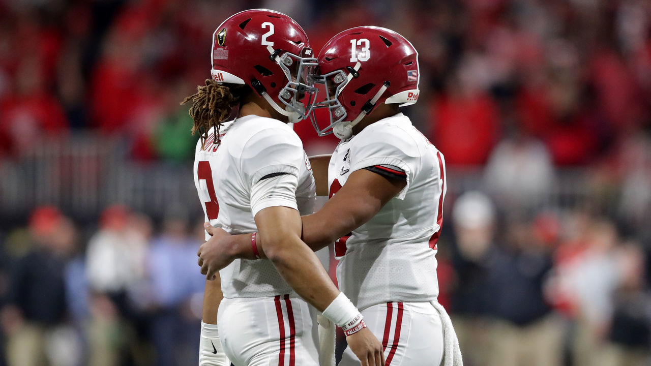 ATLANTA, GA - JANUARY 08: Tua Tagovailoa #13 celebrates a touchdown pass with Jalen Hurts #2 of the Alabama Crimson Tide during the third quarter against the Georgia Bulldogs in the CFP National Championship presented by AT&T at Mercedes-Benz Stadium on January 8, 2018 in Atlanta, Georgia.