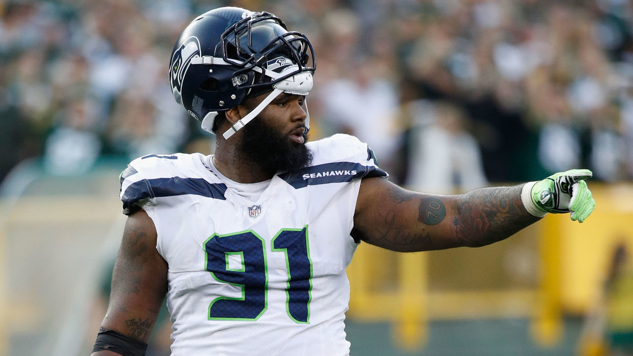 GREEN BAY, WI - SEPTEMBER 10: Sheldon Richardson #91 of the Seattle Seahawks gestures during the fourth quarter against the Green Bay Packers at Lambeau Field on September 10, 2017 in Green Bay, Wisconsin.