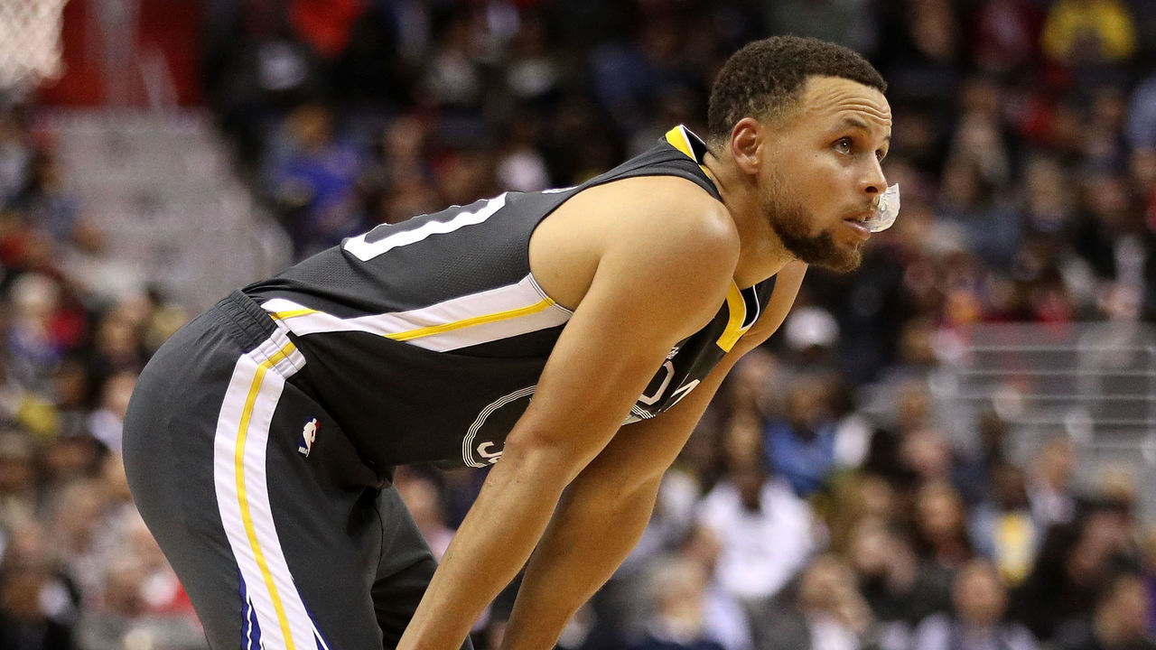 WASHINGTON, DC - FEBRUARY 28: Stephen Curry #30 of the Golden State Warriors looks on against the Washington Wizards at Capital One Arena on February 28, 2018 in Washington, DC.