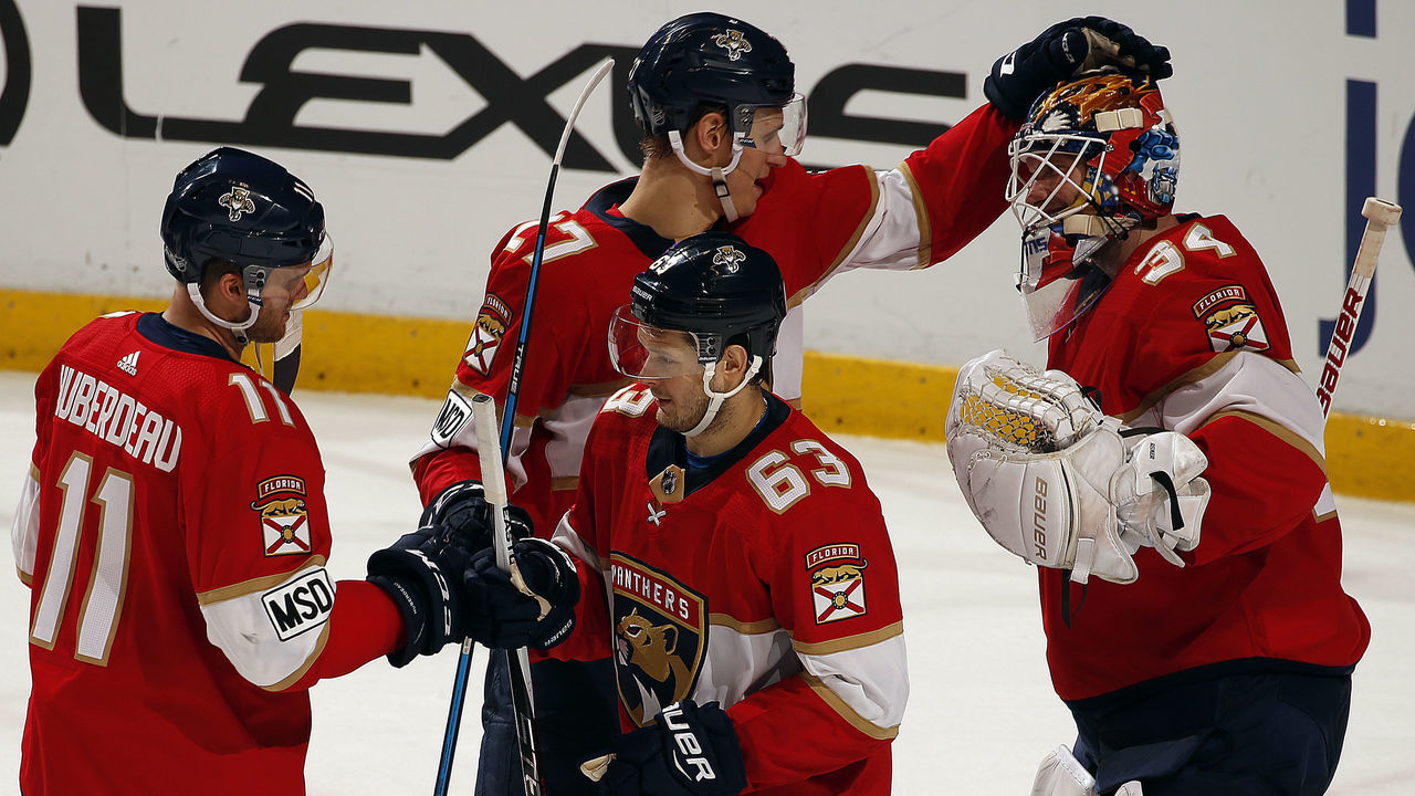 SUNRISE, FL - MARCH 2: Goaltender James Reimer #34 of the Florida Panthers celebrates their 4-1 win with teammate Nick Bjugstad #27 against the Buffalo Sabres at the BB&T Center on March 2, 2018 in Sunrise, Florida.