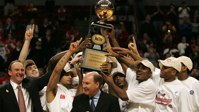 CHICAGO - MARCH 11: The Ohio State Buckeyes celebrate as they are presented with the trophy by Big Ten Commissioner Jim Delany (C, w/microphone) following Ohio St.'s 66-49 win against the Wisconsin Badgers during the Final of the Big Ten Men's Basketball Conference Tournament March 11, 2007 at the United Center in Chiago Illinois.