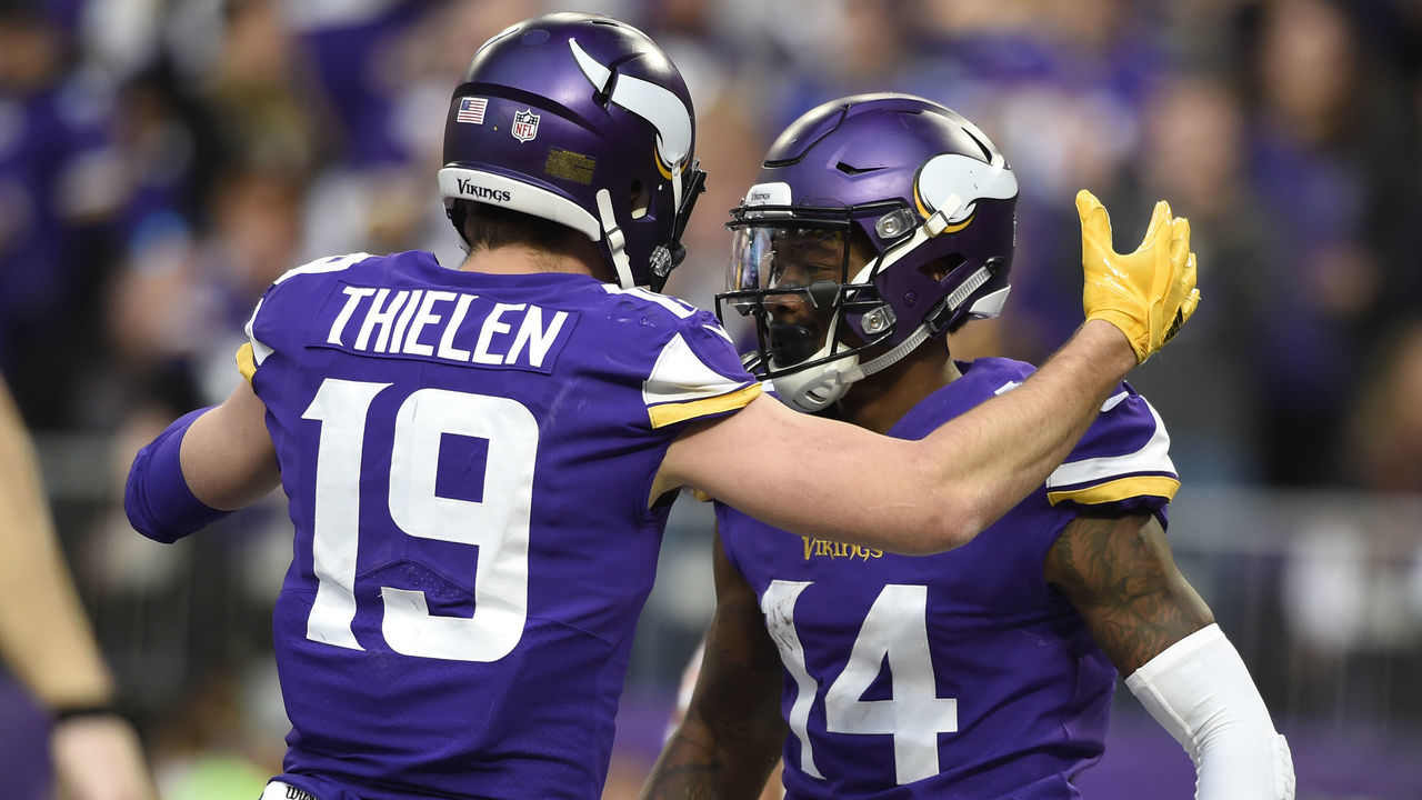 MINNEAPOLIS, MN - DECEMBER 31: Stefon Diggs #14 of the Minnesota Vikings celebrates with teammate Adam Thielen #19 after scoring a touchdown in the third quarter of the game against the Chicago Bears on December 31, 2017 at U.S. Bank Stadium in Minneapolis, Minnesota.