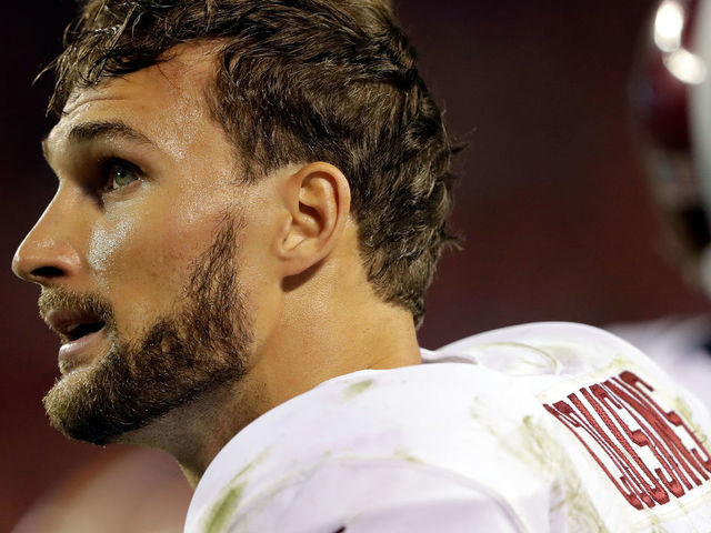 KANSAS CITY, MO - OCTOBER 02: Quarterback Kirk Cousins #8 of the Washington Redskins looks up at the scoreboard during the 4th quarter of the game against the Kansas City Chiefs at Arrowhead Stadium on October 2, 2017 in Kansas City, Missouri.
