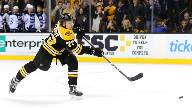BOSTON, MA - DECEMBER 21: Charlie McAvoy #73 of the Boston Bruins scores the game winning goal against the Winnipeg Jets during a shoot out at TD Garden on December 21, 2017 in Boston, Massachusetts. The Bruins defeat the Jets 2-1.