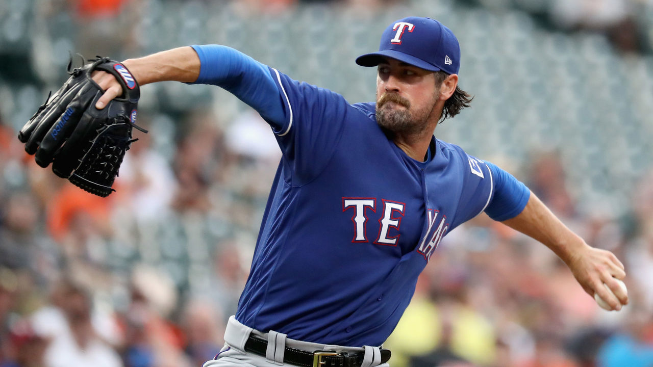 BALTIMORE, MD - JULY 20: Starting pitcher Cole Hamels #35 of the Texas Rangers throws to a Baltimore Orioles batter in the second inning at Oriole Park at Camden Yards on July 20, 2017 in Baltimore, Maryland.
