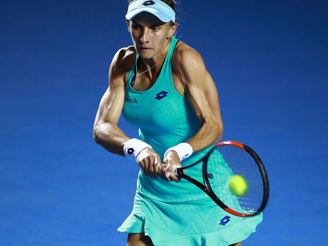 ACAPULCO, MEXICO - MARCH 03: Lesia Tsurenko of Ukraine returns a shot during the Championship match between Stefanie Voegele of Switzerland and Lesia Tsurenko of Ukraine as part of the Telcel ATP Mexican Open 2018 at Mextenis Stadium on March 03, 2018 in Acapulco, Mexico.