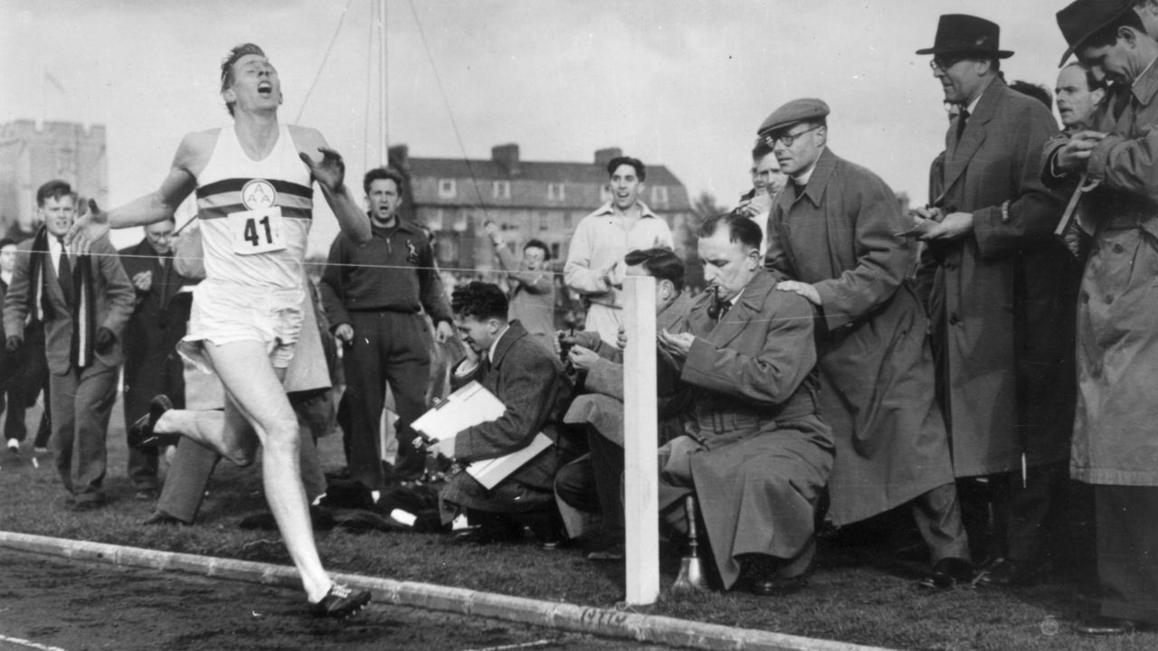 Roger Bannister about to cross the tape at the end of his record breaking mile run at Iffley Road, Oxford. He was the first person to run the mile in under four minutes, with a time of 3 minutes 59.4 seconds.