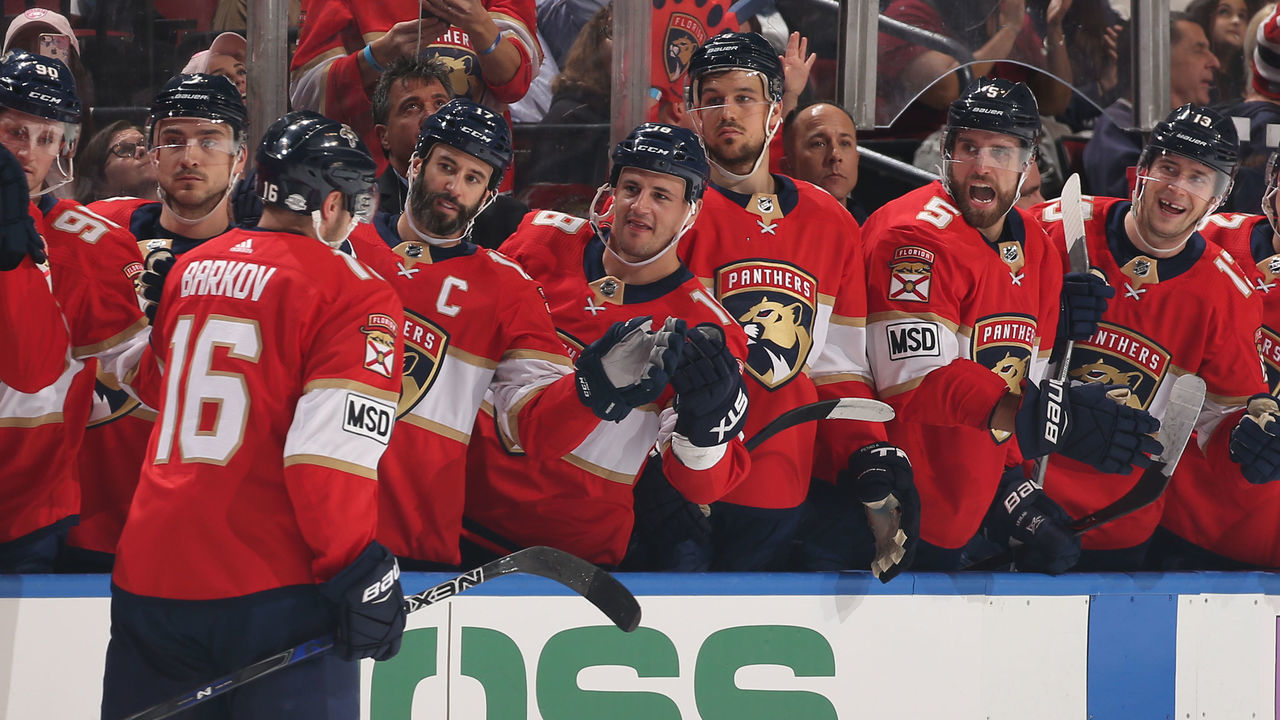 SUNRISE, FL - FEBRUARY 27: Aleksander Barkov #16 of the Florida Panthers is congratulated by teammates after scoring a first period goal against the Toronto Maple Leafs at the BB&T Center on February 27, 2018 in Sunrise, Florida.