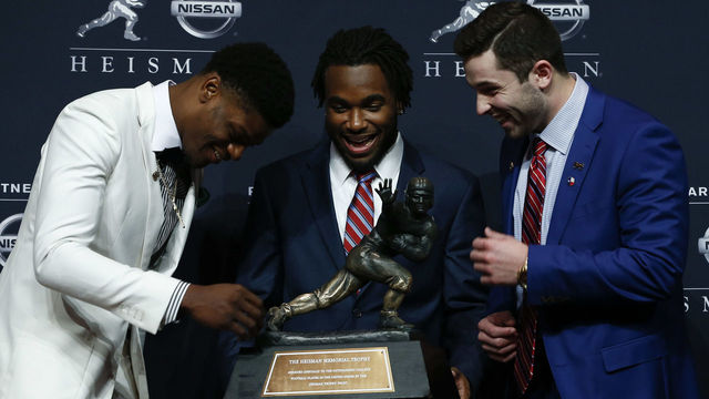 NEW YORK, NY - DECEMBER 09: Lamar Jackson of Louisville (L), Bryce Love of Stanford and Baker Mayfield of Oklahoma attend the press conference for the 2017 Heisman Trophy Presentation on December 9, 2017 in New York City.
