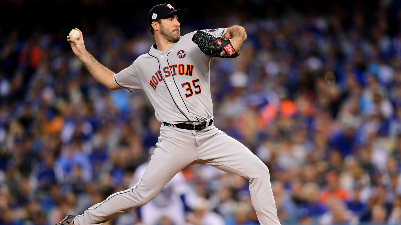 LOS ANGELES, CA - OCTOBER 31: Justin Verlander #35 of the Houston Astros throws a pitch during the first inning against the Los Angeles Dodgers in game six of the 2017 World Series at Dodger Stadium on October 31, 2017 in Los Angeles, California.