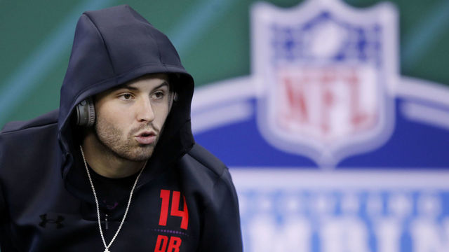 INDIANAPOLIS, IN - MARCH 03: Oklahoma quarterback Baker Mayfield looks on during the NFL Combine at Lucas Oil Stadium on March 3, 2018 in Indianapolis, Indiana.