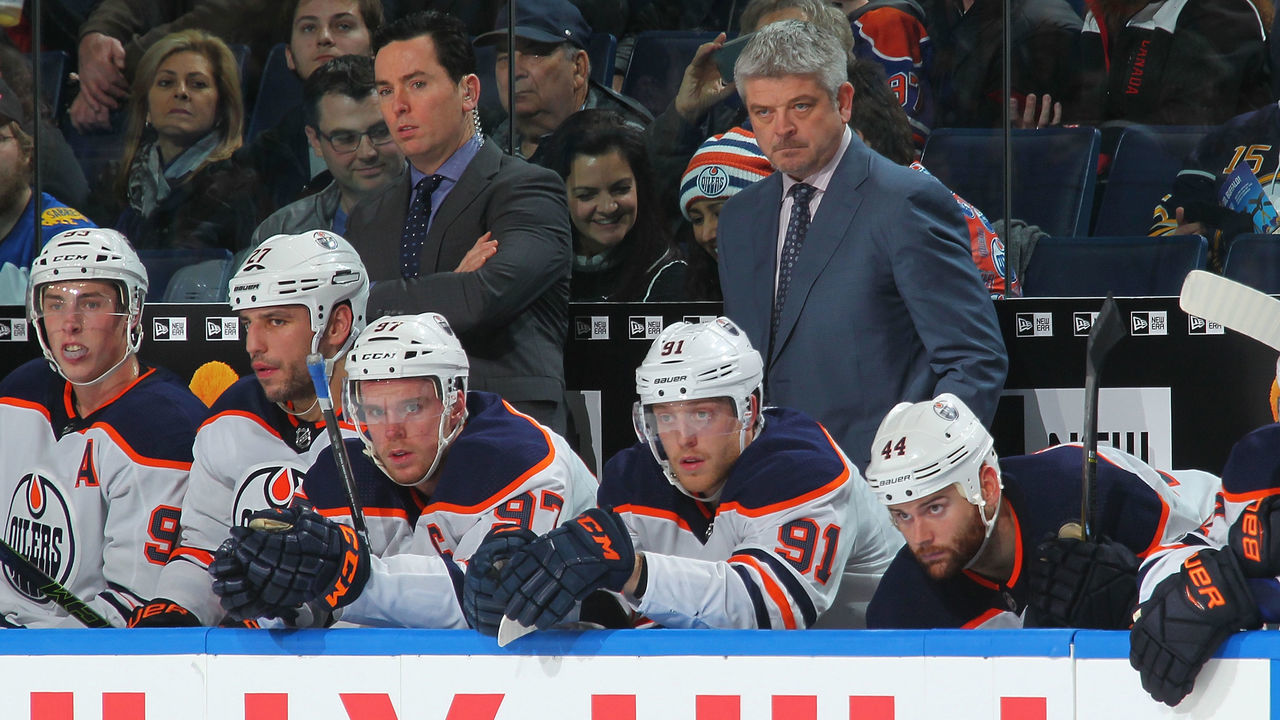 BUFFALO, NY - NOVEMBER 24: Edmonton Oilers head coach Todd McLellan and Connor McDavid #97 watch the action during an NHL game against the Buffalo Sabres on November 24, 2017 at KeyBank Center in Buffalo, New York. Buffalo won, 3-1.