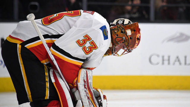 LAS VEGAS, NV - FEBRUARY 21: David Rittich #33 of the Calgary Flames takes a break during a stop in play in the second period of a game against the Vegas Golden Knights at T-Mobile Arena on February 21, 2018 in Las Vegas, Nevada. The Golden Knights won 7-3.