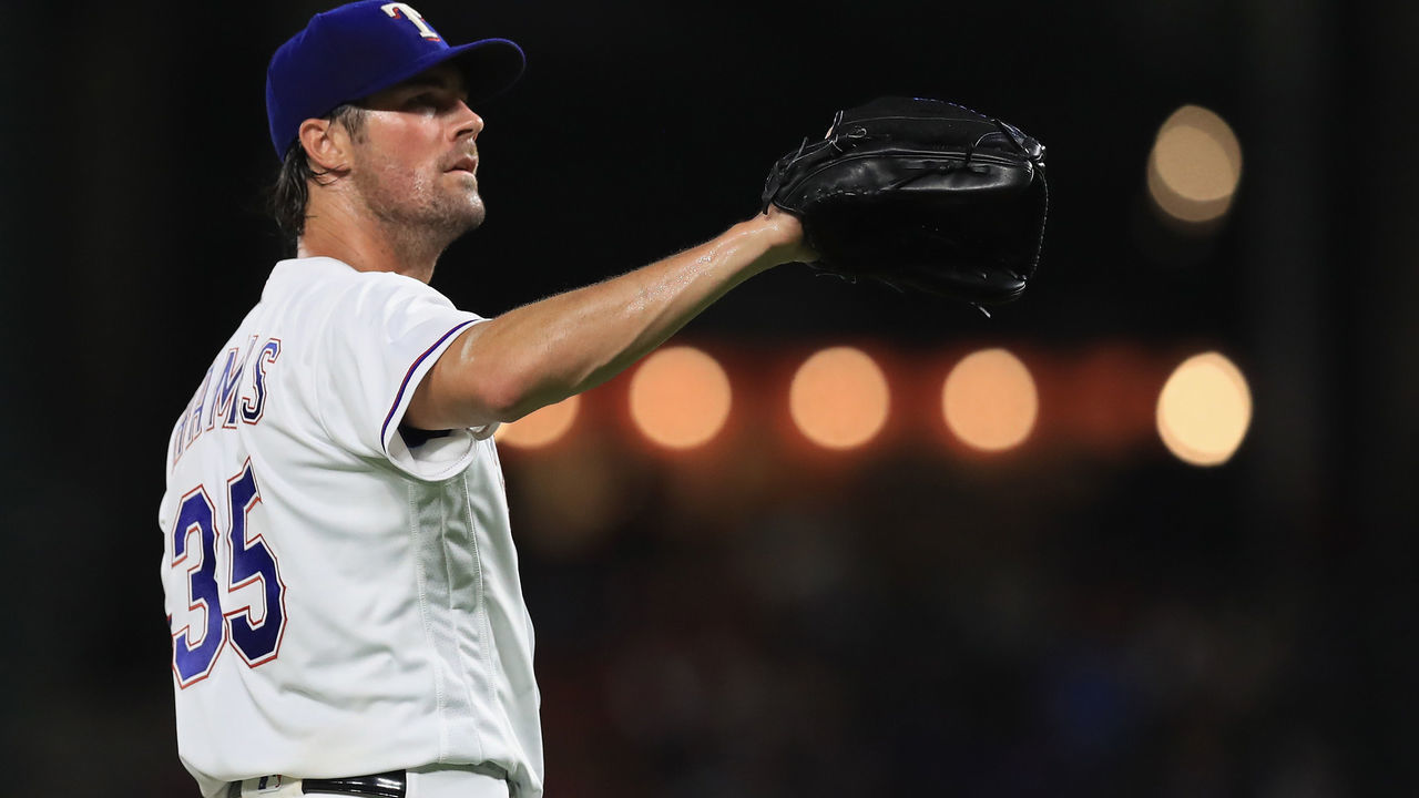 ARLINGTON, TX - AUGUST 11: Cole Hamels #35 of the Texas Rangers throws against the Houston Astros at Globe Life Park in Arlington on August 11, 2017 in Arlington, Texas.