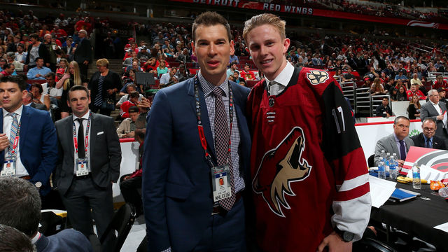 CHICAGO, IL - JUNE 24: MacKenzie Entwistle poses for a photo with general manager John Chayka after being selected 69th overall by the Arizona Coyotes during the 2017 NHL Draft at the United Center on June 24, 2017 in Chicago, Illinois.