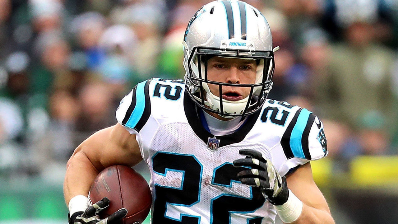 EAST RUTHERFORD, NJ - NOVEMBER 26: Christian McCaffrey #22 of the Carolina Panthers runs the ball in the first half against the New York Jets during their game at MetLife Stadium on November 26, 2017 in East Rutherford, New Jersey.