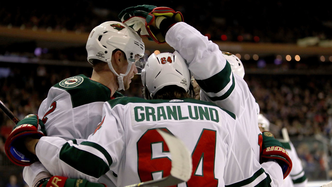 NEW YORK, NY - FEBRUARY 23: Mikael Granlund #64 of the Minnesota Wild celebrates with teammates after scoring a goal in the first period against the New York Rangers during their game at Madison Square Garden on February 23, 2018 in New York City.