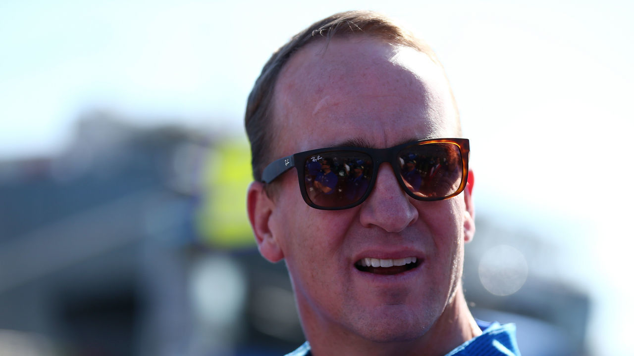 DAYTONA BEACH, FL - FEBRUARY 18: Two-time Super Bowl winning quarterback Peyton Manning stands on the grid prior to the Monster Energy NASCAR Cup Series 60th Annual Daytona 500 at Daytona International Speedway on February 18, 2018 in Daytona Beach, Florida.
