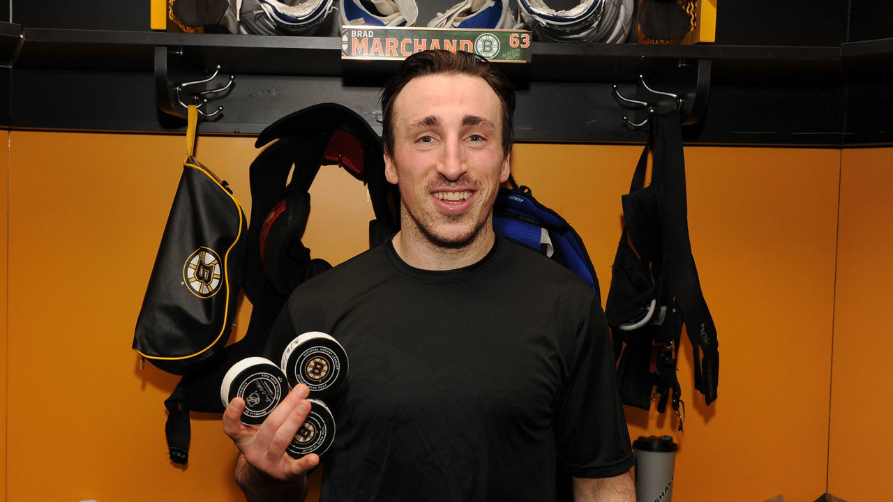 BOSTON, MA - MARCH 6: Brad Marchand #63 of the Boston Bruins celebrates his hat trick after the win against the Detroit Red Wings at the TD Garden on March 6, 2018 in Boston, Massachusetts.