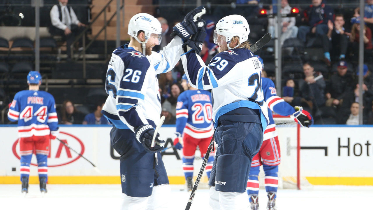 NEW YORK, NY - MARCH 06: Patrik Laine #29 of the Winnipeg Jets celebrates after scoring his third goal of the game in the third period against the New York Rangers at Madison Square Garden on March 6, 2018 in New York City.
