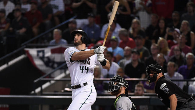 PHOENIX, AZ - OCTOBER 04: Paul Goldschmidt #44 of the Arizona Diamondbacks watches hits a three run home run during the bottom of the first inning of the National League Wild Card game against the Colorado Rockies at Chase Field on October 4, 2017 in Phoenix, Arizona.