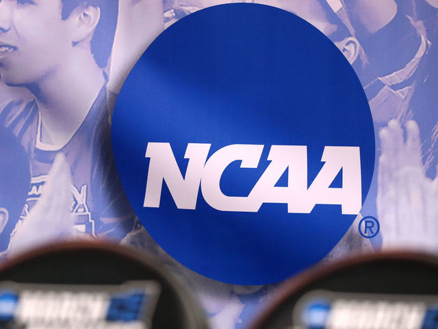 SALT LAKE CITY, UT - MARCH 16: The NCAA logo is seen in the second half of the game between the Northwestern Wildcats and the Vanderbilt Commodores during the first round of the 2017 NCAA Men's Basketball Tournament at Vivint Smart Home Arena on March 16, 2017 in Salt Lake City, Utah.