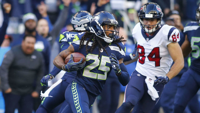 SEATTLE, WA - OCTOBER 29: Cornerback Richard Sherman #25 of the Seattle Seahawks intercepts quarterback Deshaun Watson #4 of the Houston Texans with 16 seconds left in the fourth quarter of the game at CenturyLink Field on October 29, 2017 in Seattle, Washington. The Seattle Seahawks beat the Houston Texans 41-38.