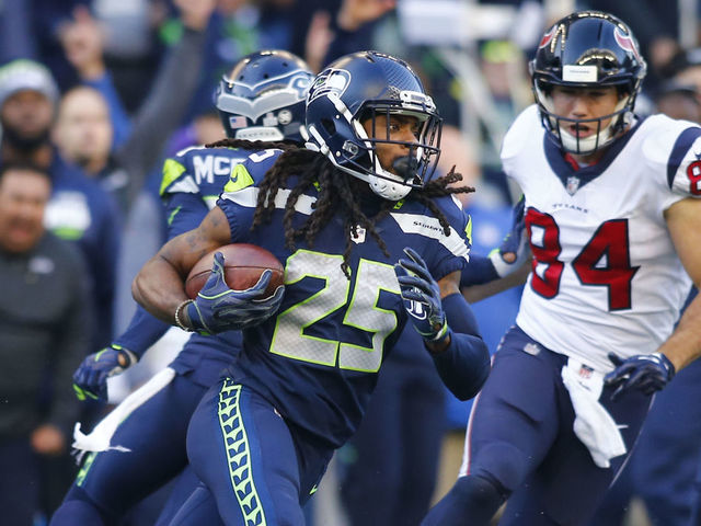 SEATTLE, WA - OCTOBER 29: Cornerback Richard Sherman #25 of the Seattle Seahawks intercepts quarterback Deshaun Watson #4 of the Houston Texans with 16 seconds left in the fourth quarter of the game at CenturyLink Field on October 29, 2017 in Seattle, Washington. The Seattle Seahawks beat the Houston Texans 41-38.