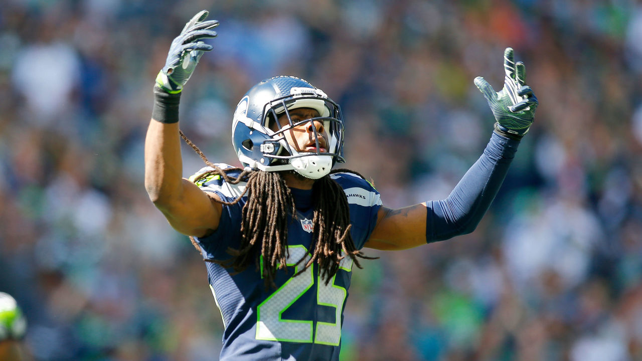 SEATTLE, WA - SEPTEMBER 11: Cornerback Richard Sherman #25 of the Seattle Seahawks gets the crowd going against the Miami Dolphins in the first half at CenturyLink Field on September 11, 2016 in Seattle, Washington.