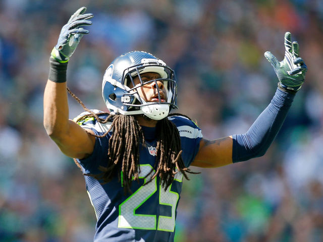 SEATTLE, WA - SEPTEMBER 11: Cornerback Richard Sherman #25 of the Seattle Seahawks gets the crowd going against the Miami Dolphins in the first half at CenturyLink Field on September 11, 2016 in Seattle, Washington.