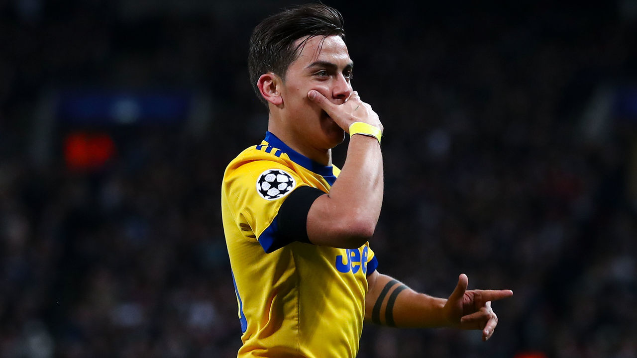 LONDON, ENGLAND - MARCH 07: Paulo Dybala of Juventus celebrates after scoring his team's second goal during the UEFA Champions League Round of 16 Second Leg match between Tottenham Hotspur and Juventus at Wembley Stadium on March 7, 2018 in London, United Kingdom.