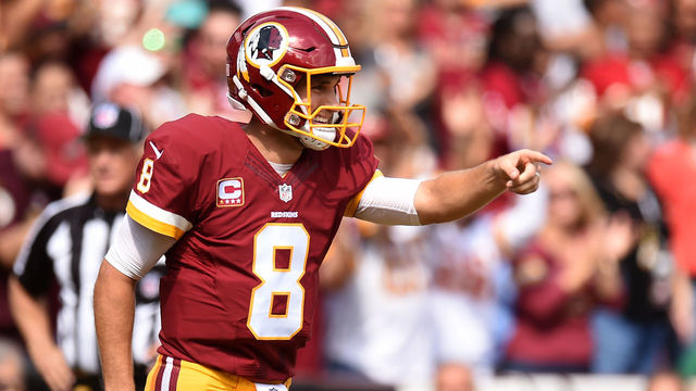 LANDOVER, MD - OCTOBER 2: Quarterback Kirk Cousins #8 of the Washington Redskins celebrates after throwing a first quarter touchdown pass to tight end Jordan Reed #86 (not pictured) against the the Cleveland Browns at FedExField on October 2, 2016 in Landover, Maryland.