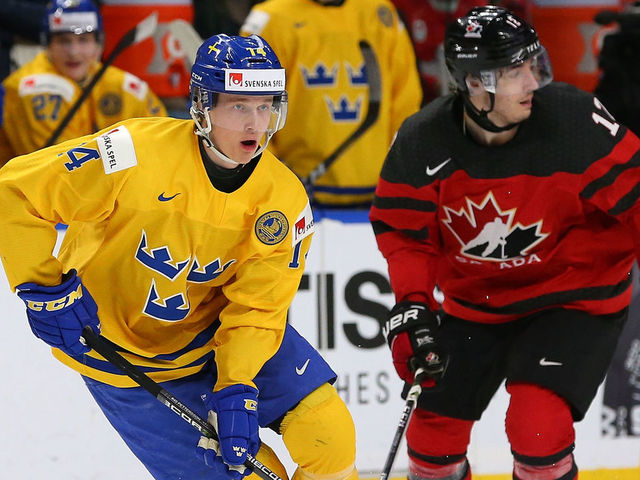 BUFFALO, NY - JANUARY 5: Elias Pettersson #14 of Sweden in play against Canada during the Gold medal game of the IIHF World Junior Championship at KeyBank Center on January 5, 2018 in Buffalo, New York. Canada beat Sweden 3-1.