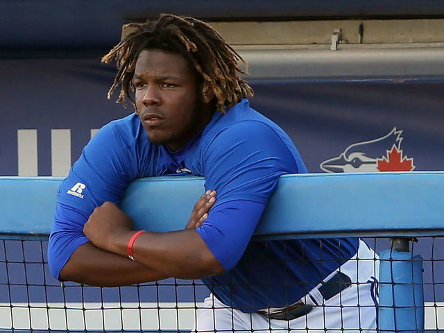 TAMPA, FL - AUG 14: Vladimir Guerrero Jr. (27) of the Blue Jays watches the action from the top step of the dugout during the Florida State League game between the Palm Beach Cardinals and the Dunedin Blue Jays on August 14, 2017, at Florida Auto Exchange Stadium in Dunedin, FL.